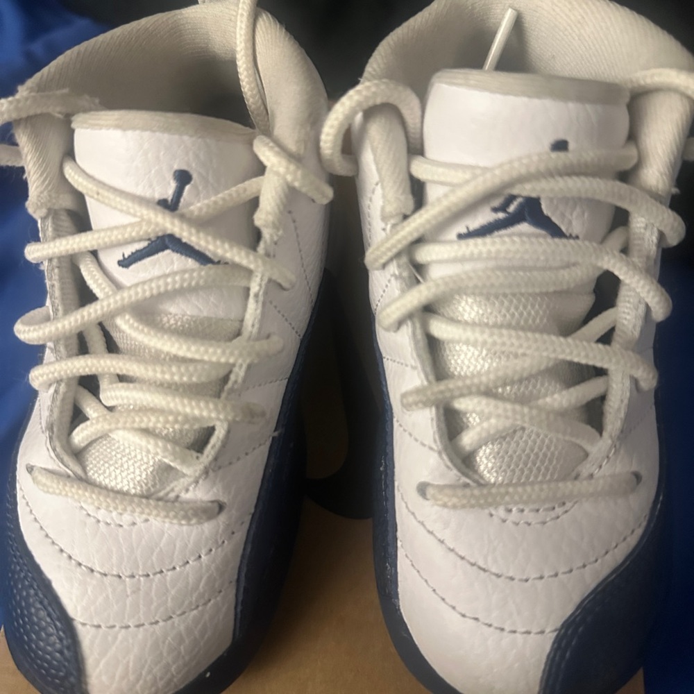 Jordan 12’s Kids White and Navy Blue Sneakers